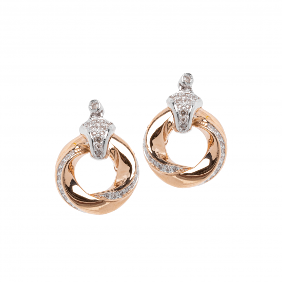 اقراط الماس الراوند من مجموعة دازل ذهب عيار 18