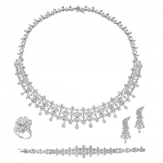 طقم دمعة ألماس الراوند من مجموعة"دازل برايد" ذهب18 طقم دمعة ألماس الراوند من مجموعة"دازل برايد" ذهب18