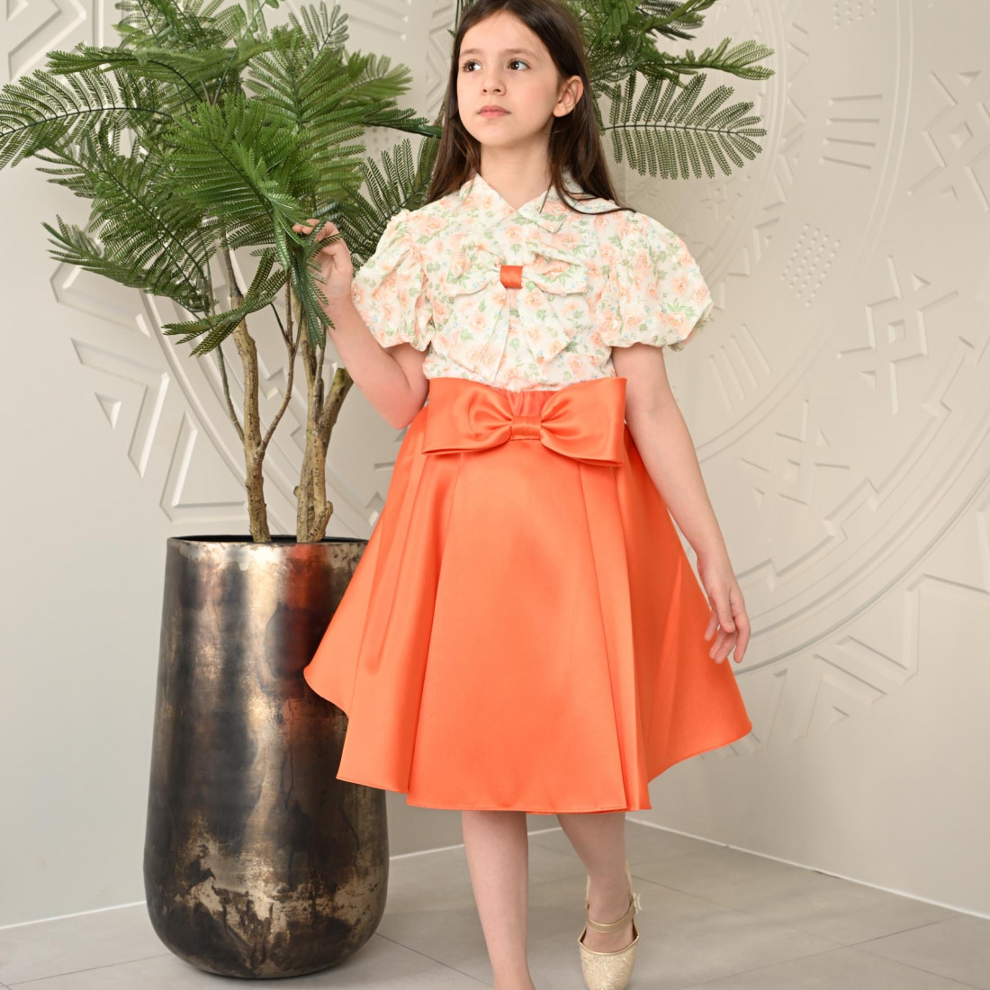 طقم تيور بناتي برتقالي بأكمام منقوشة