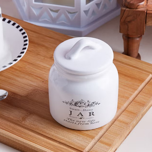 علبة تخزين سكر تحمل عبارة "Sweet Home" أبيض 8.5x10.5سم علبة تخزين سكر تحمل عبارة "Sweet Home" أبيض 8.5x10.5سم