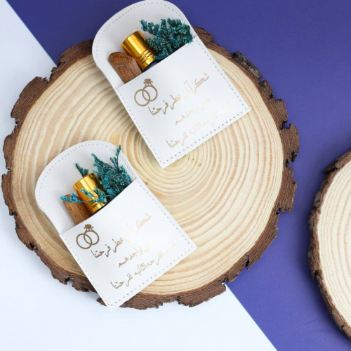 توزيعات الجلد (12 ) بطباعة تولت عطر مع كسر عود 