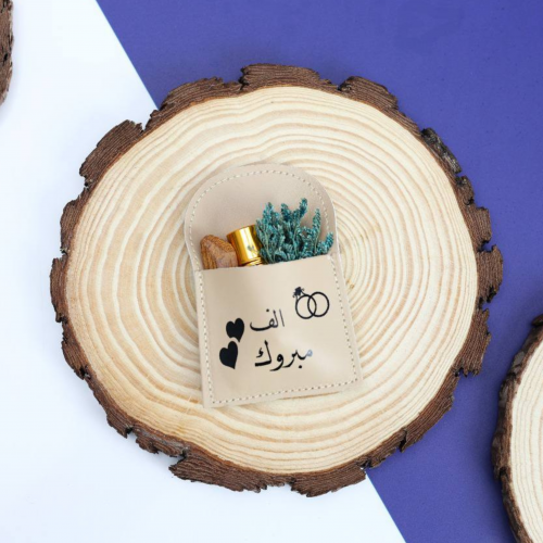 توزيعات الجلد (12 ) بطباعة تولت عطر مع كسر عود 